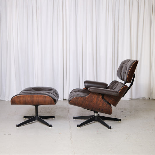 Charles & Ray Eames Lounge Chair -lepotuoli ja rahi