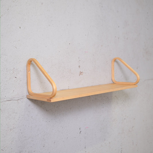 Artek 112B wall shelf by Alvar Aalto in birch with bentwood brackets, photographed in Pino Interiors showroom.