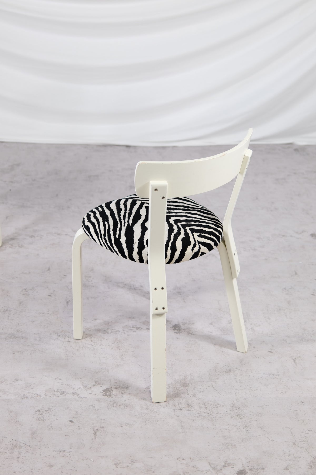 Artek 69 Chairs White Frame with Zebra Upholstery