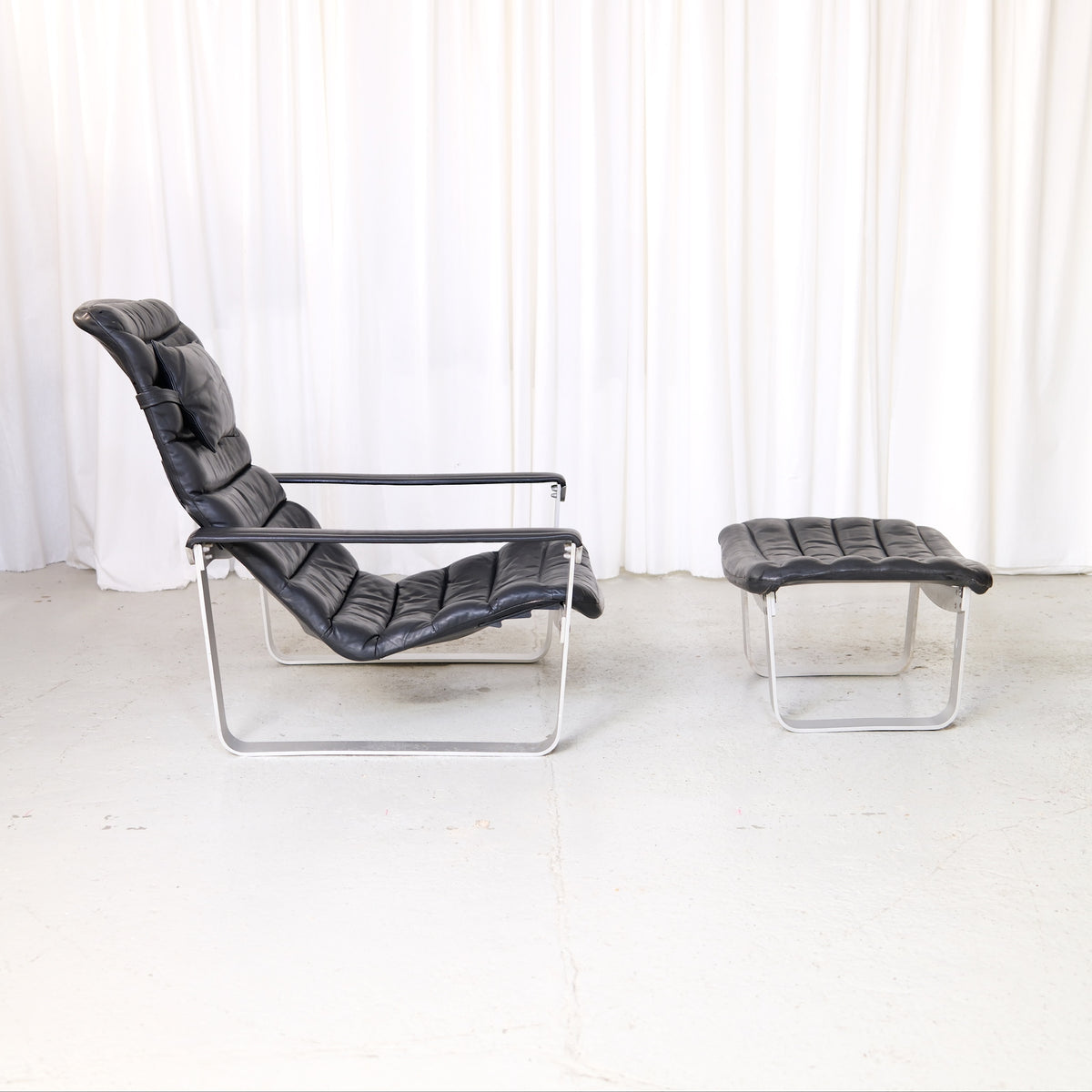 Ilmari Lappalainen Pulkka Lounge Chair with Ottoman in Black Leather