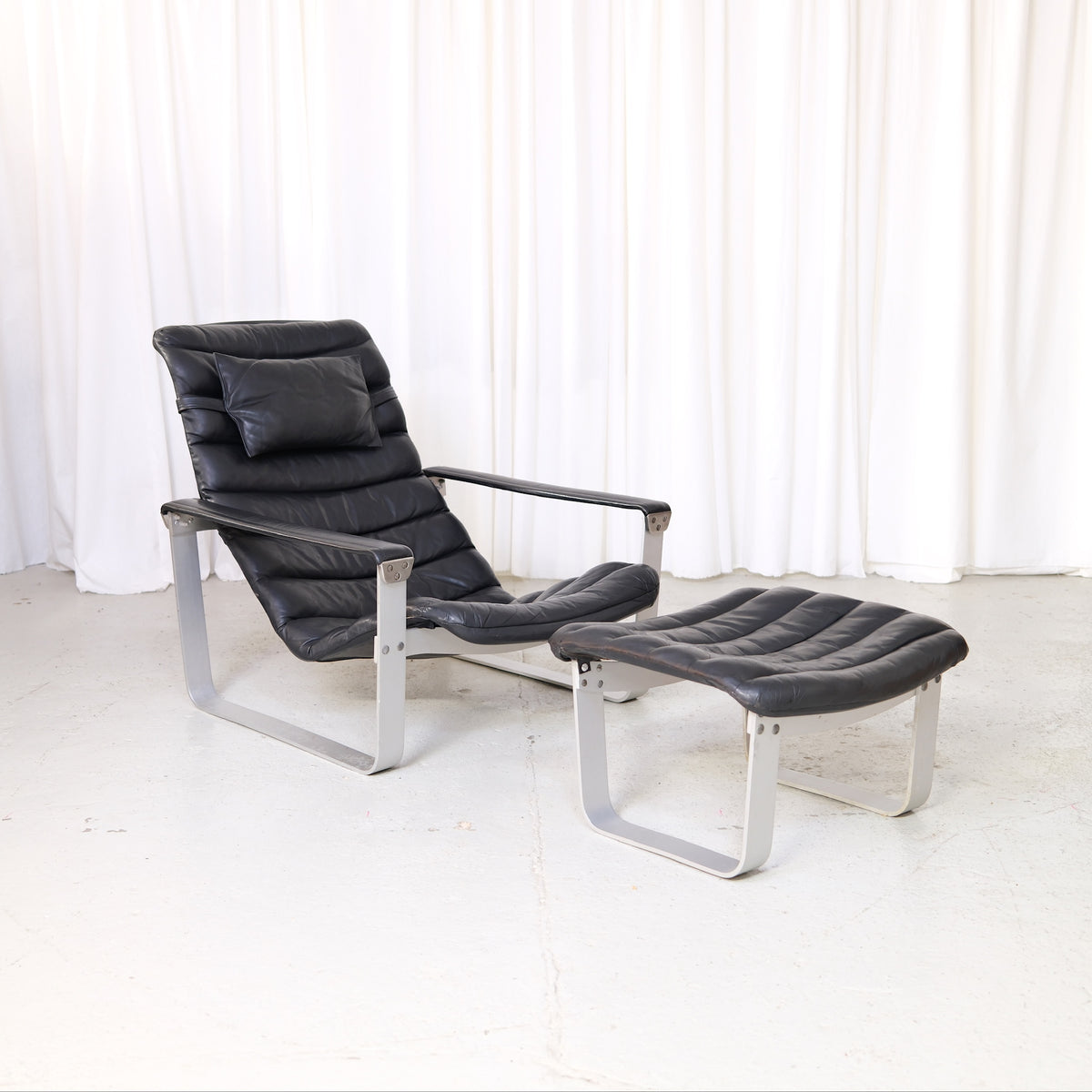 Ilmari Lappalainen Pulkka Lounge Chair with Ottoman in Black Leather