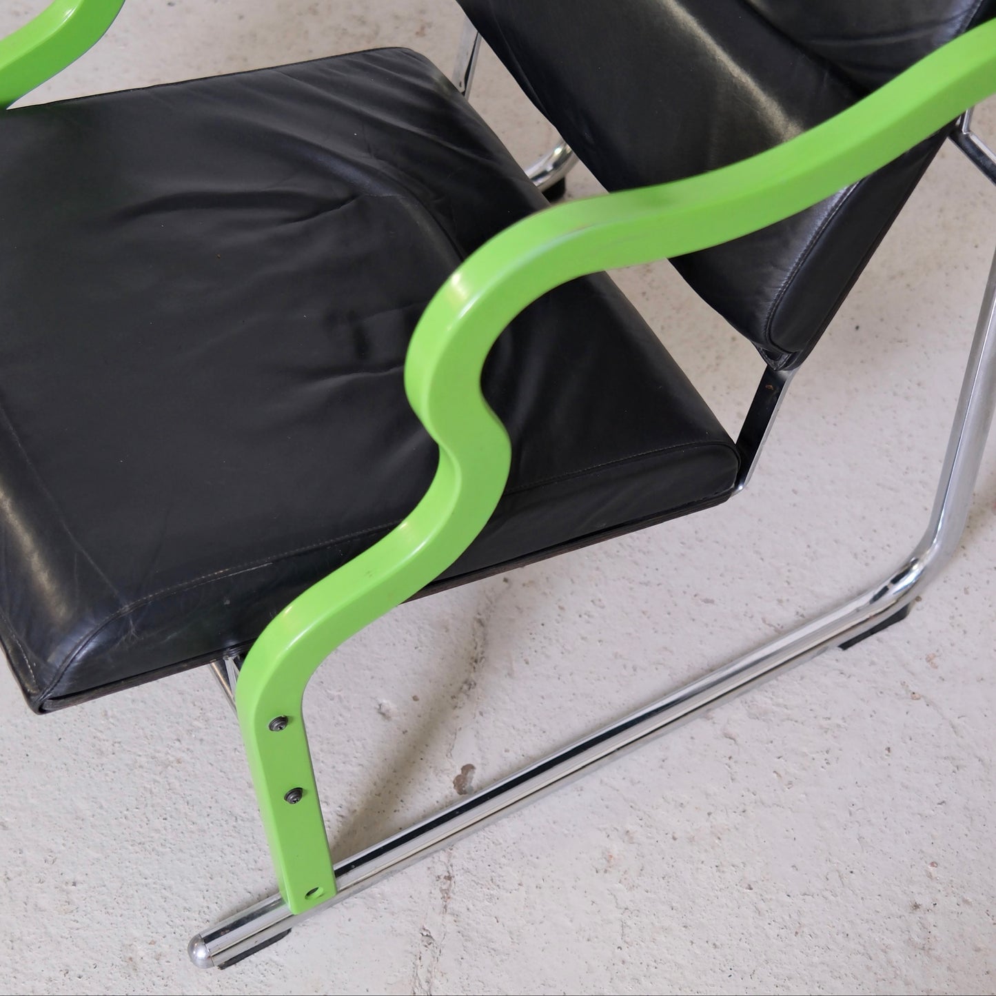 Yrjö Kukkapuro Experiment Lounge Chair in Black Leather and Green Armrests