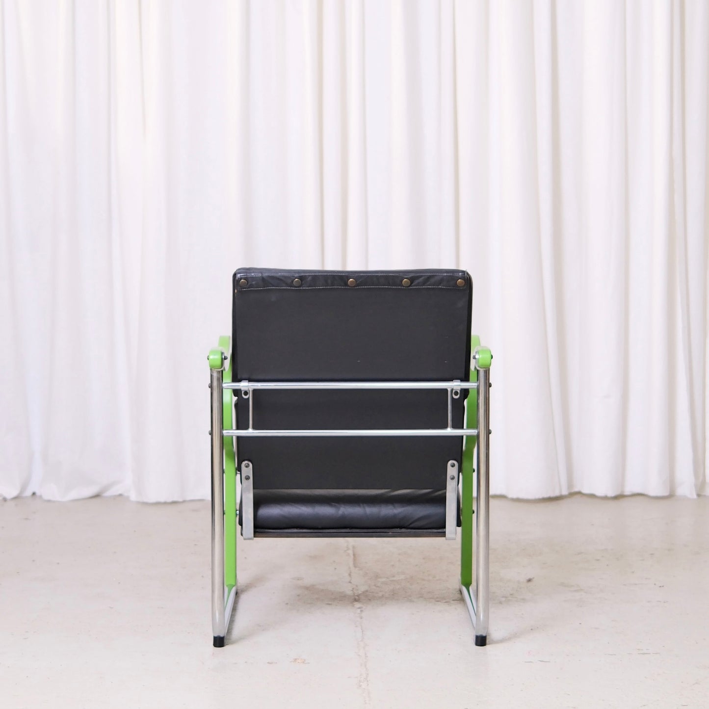 Yrjö Kukkapuro Experiment Lounge Chair in Black Leather and Green Armrests