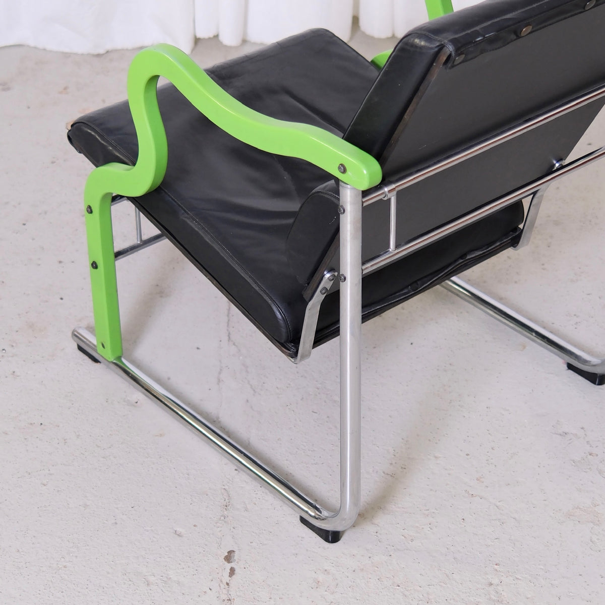 Yrjö Kukkapuro Experiment Lounge Chair in Black Leather and Green Armrests
