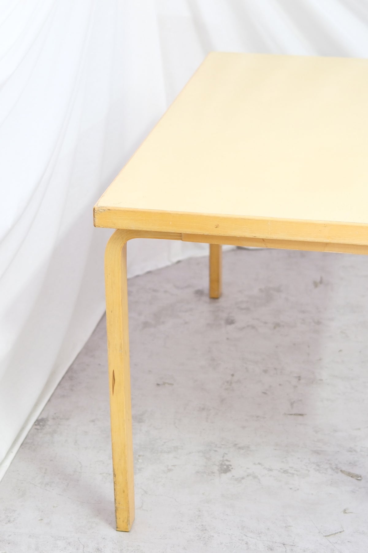 Artek 81B table, light yellow laminate