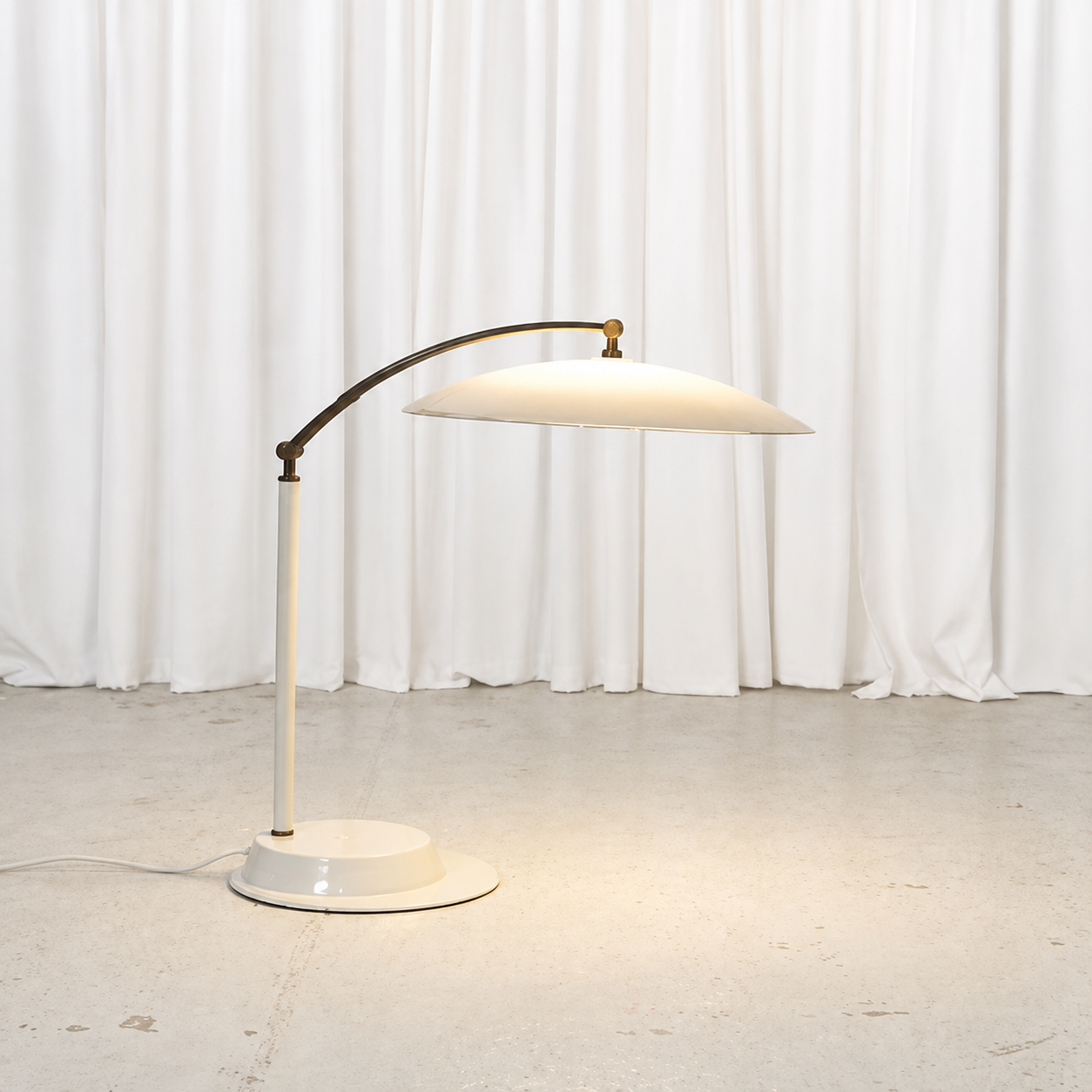Vintage adjustable table lamp with white acrylic shade and brass arm